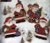 Dimensions 9124. Four Jolly Santa Ornaments