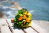 selective-focus-shot-of-beautiful-wedding-bouquet-on-the-background-of-the-sea_94863-157.thumb.jpg.d43496f5832800654b6aba82c31b667b.jpg